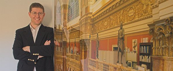 Lyons stands next to a 6x7 foot print of the Library of Congress